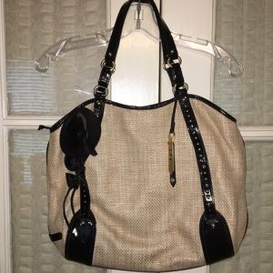 Cole Haan straw type handbag with blue interior